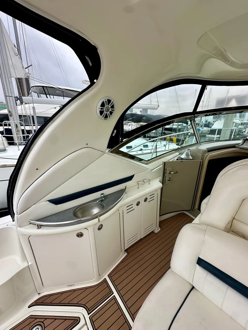 Slide: The Image of Interior of a 2006 Sea Ray 44 Sundancer yacht with sleek design and modern amenities. - 15