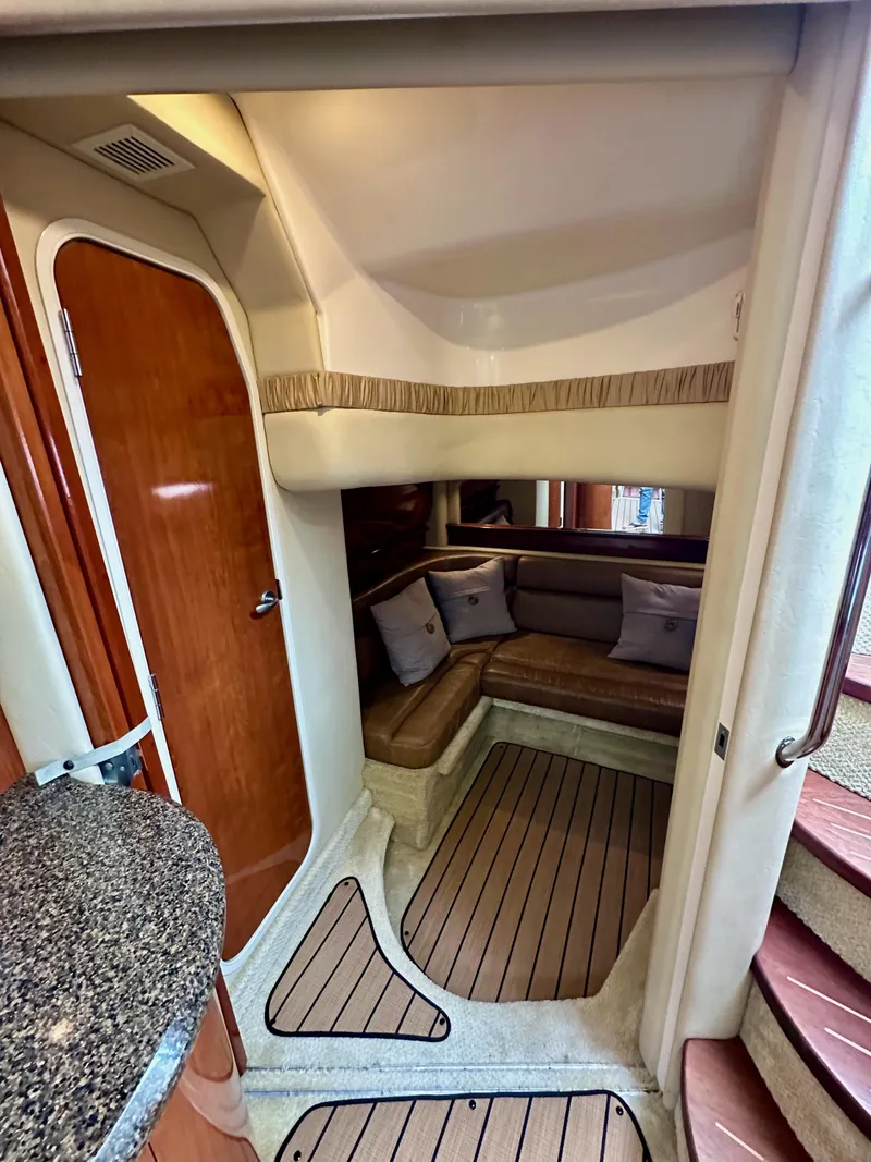 Slide: The Image of Interior of 2006 Sea Ray 44 Sundancer yacht with cozy seating and elegant wood finishes. - 40