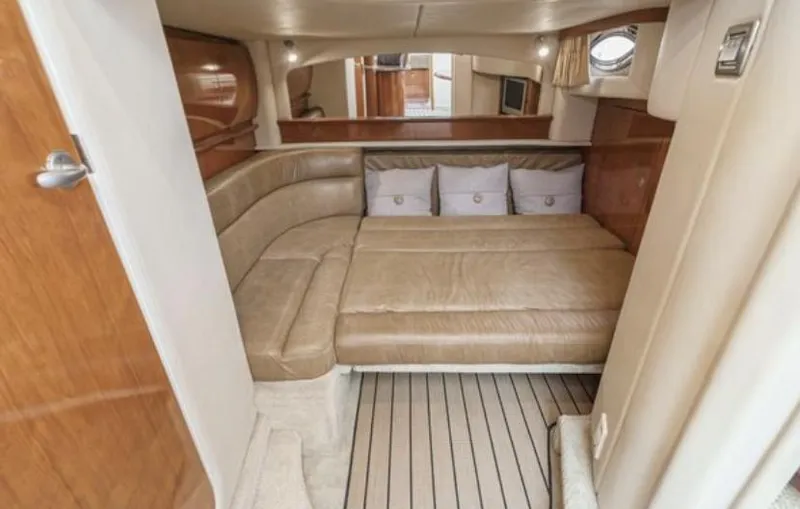 Slide: The Image of Luxurious interior of 2006 Sea Ray 44 Sundancer yacht with beige leather seating. - 43