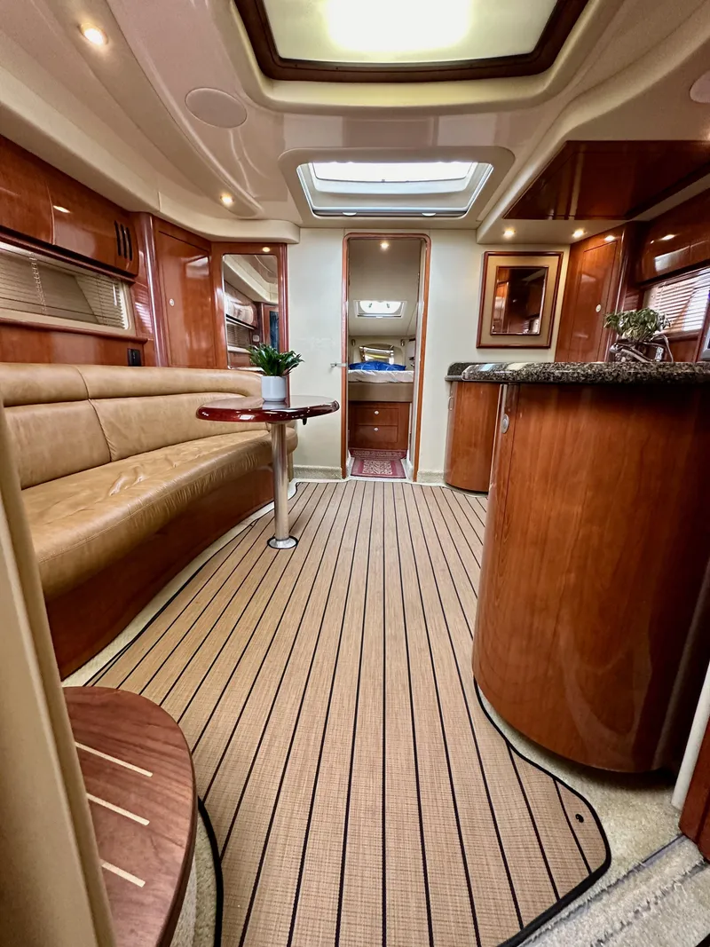 Slide: The Image of Luxurious interior of a 2006 Sea Ray 44 Sundancer yacht with elegant wood finishes. - 47