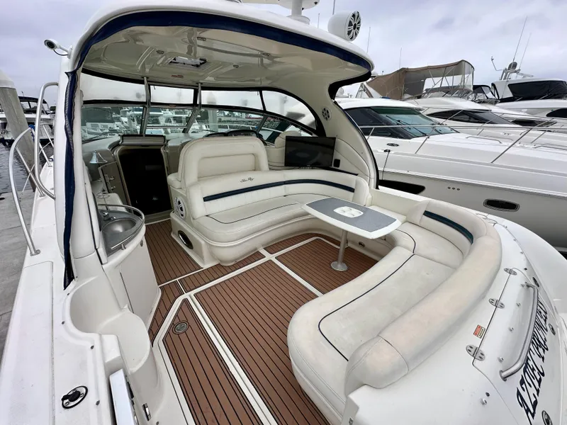 Slide: The Image of 2006 Sea Ray 44 Sundancer yacht with spacious seating and elegant interior design. - 8