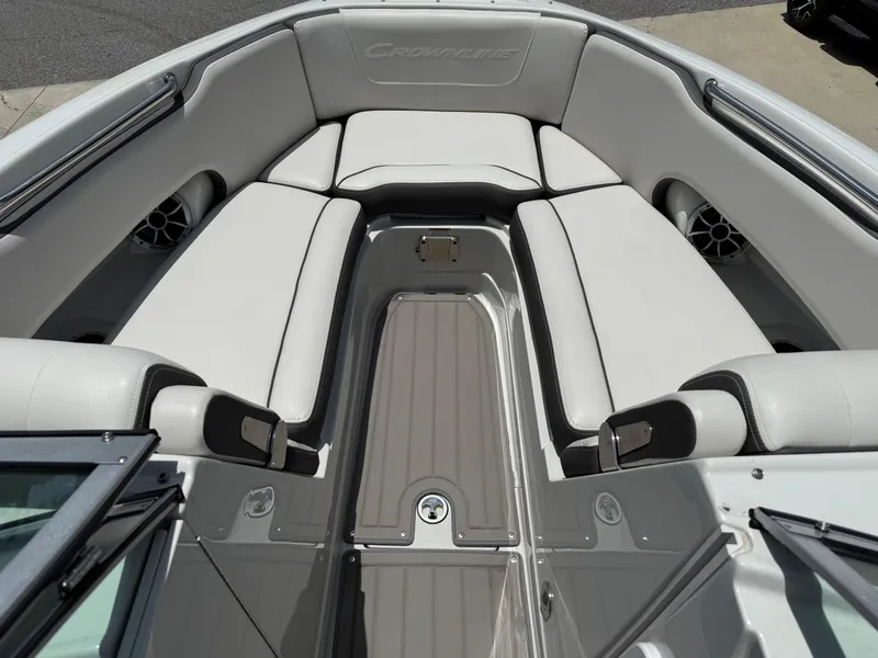 Slide: The Image of 2023 Crownline 250 XSS boat interior with spacious seating and modern design. - 8