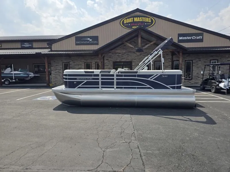 Slide: The Image of 2025 Bennington 20 SL pontoon boat parked outside Boat Masters dealership. - 11
