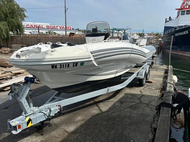 Slide: The Image of 2020 Zodiac N-Z0 680 boat on trailer at canal boat yard. - 2