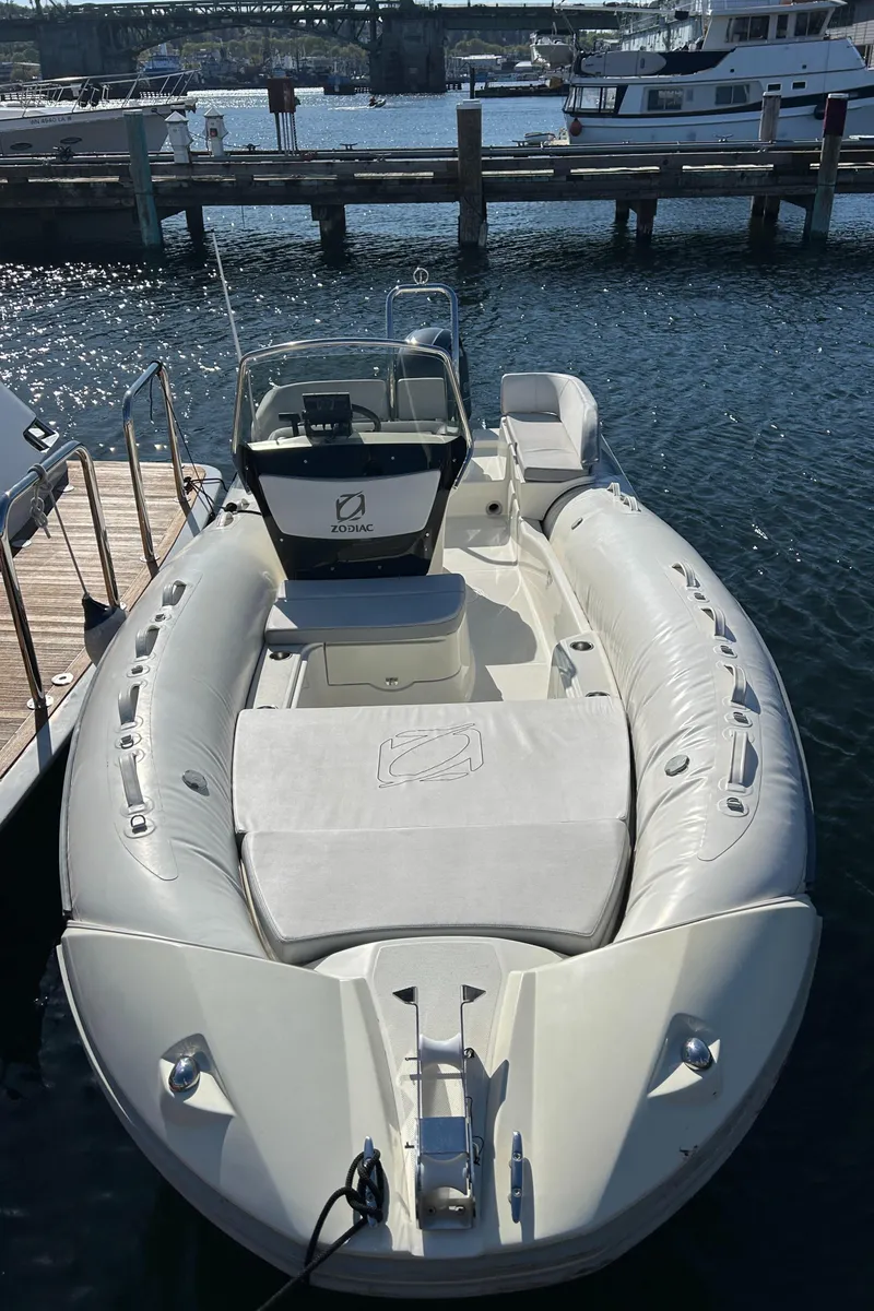 Slide: The Image of 2020 Zodiac N-Z0 680 inflatable boat docked at marina. - 5
