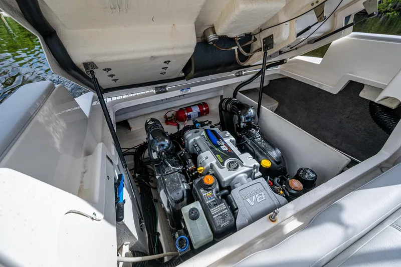 Slide: The Image of Engine compartment of 2022 Sea Ray SDX 290 boat, showcasing detailed mechanical components. - 8