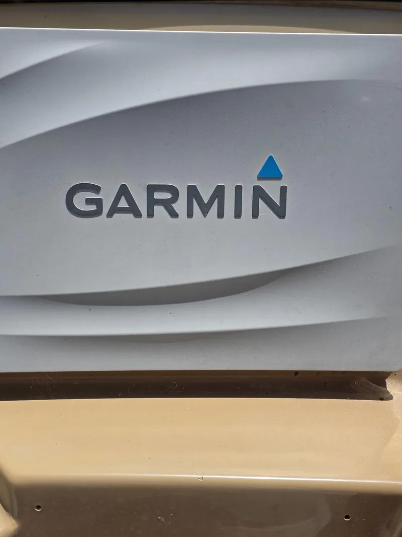 Slide: The Image of Garmin logo on a 2000 Carver 396 Motor Yacht. - 16