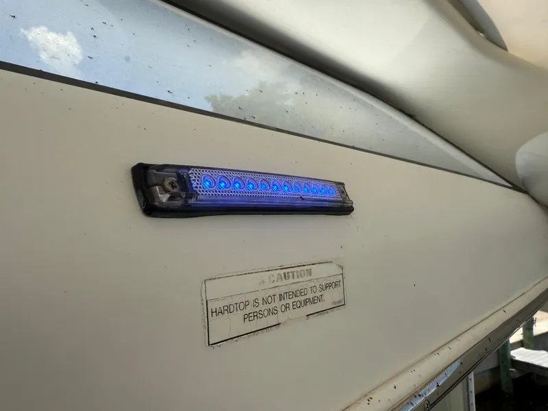 Slide: The Image of Blue LED light and caution sign on 2001 Carver 396 Motor Yacht exterior. - 25