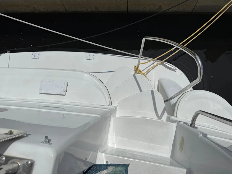 Slide: The Image of 2001 Carver 396 Motor Yacht deck with railing and mooring lines. - 28