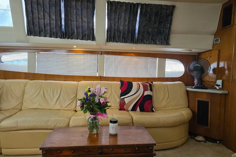 Slide: The Image of Luxurious interior of 2001 Carver 396 Motor Yacht with leather seating and decorative accents. - 39