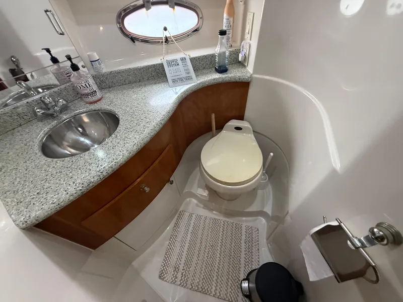 Slide: The Image of Bathroom interior of 2001 Carver 396 Motor Yacht with sink and toilet. - 54