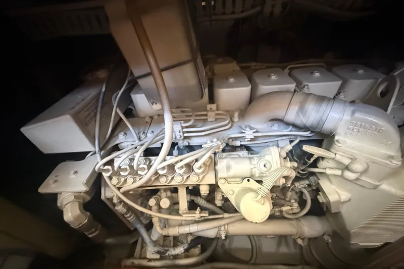 Slide: The Image of Engine of a 2001 Carver 396 Motor Yacht, showcasing intricate mechanical components. - 59