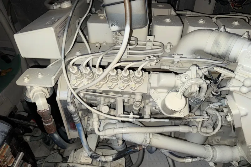 Slide: The Image of Engine components of a 2001 Carver 396 Motor Yacht, showcasing intricate mechanical details. - 60