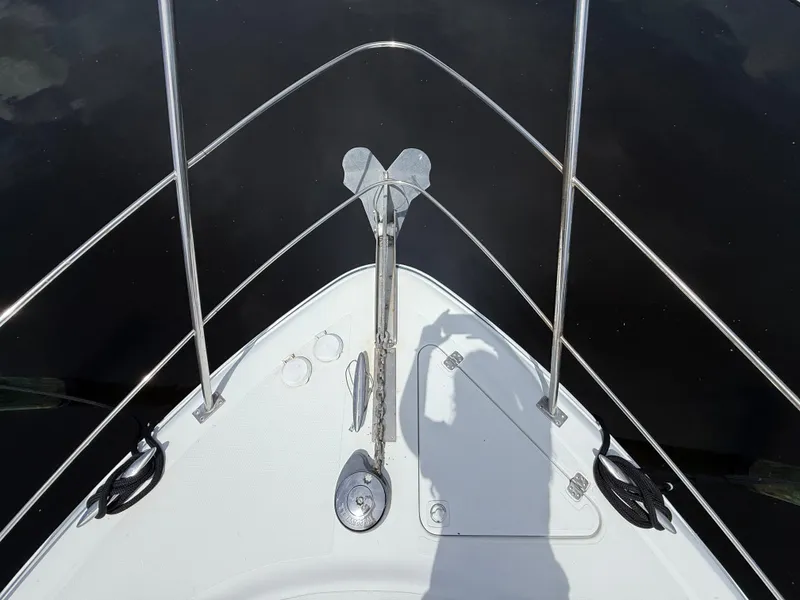 Slide: The Image of Bow of 2001 Carver 396 Motor Yacht with anchor and railing. - 9