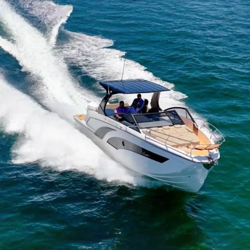 The Image of 2025 Hanover 347 Inboard boat cruising on open water, showcasing sleek design and performance. - 0