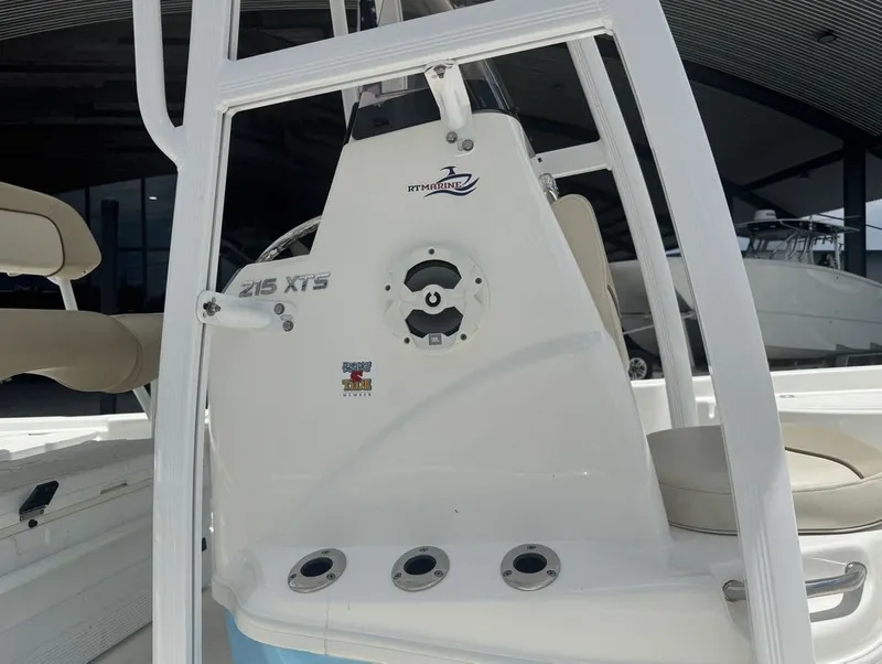 Slide: The Image of NauticStar 215 Bay 2022 boat deck with accessories. - 14