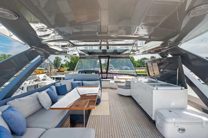Slide: The Image of Luxurious 2018 Ferretti Yachts 780 deck with elegant seating and modern amenities. - 10