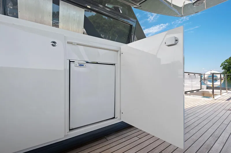 Slide: The Image of Open storage compartment on 2018 Ferretti Yachts 780 deck, showcasing sleek design and functionality. - 18