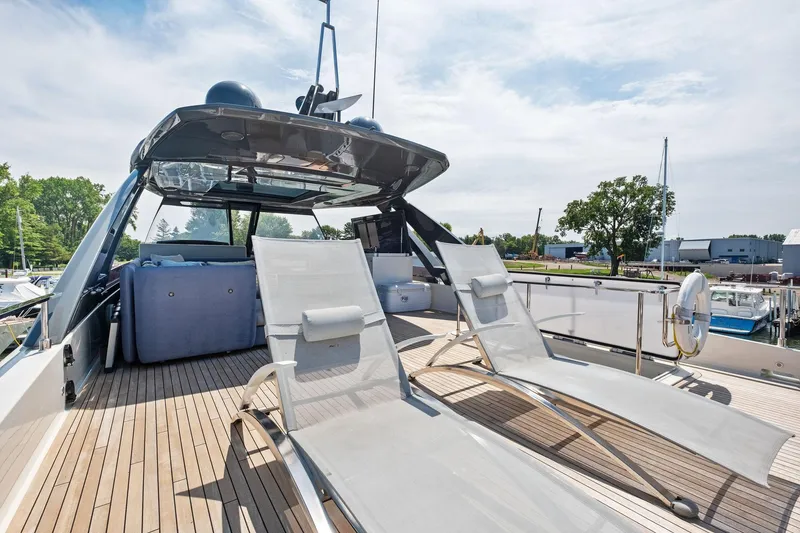 Slide: The Image of 2018 Ferretti Yachts 780 deck with sun loungers and modern design. - 19