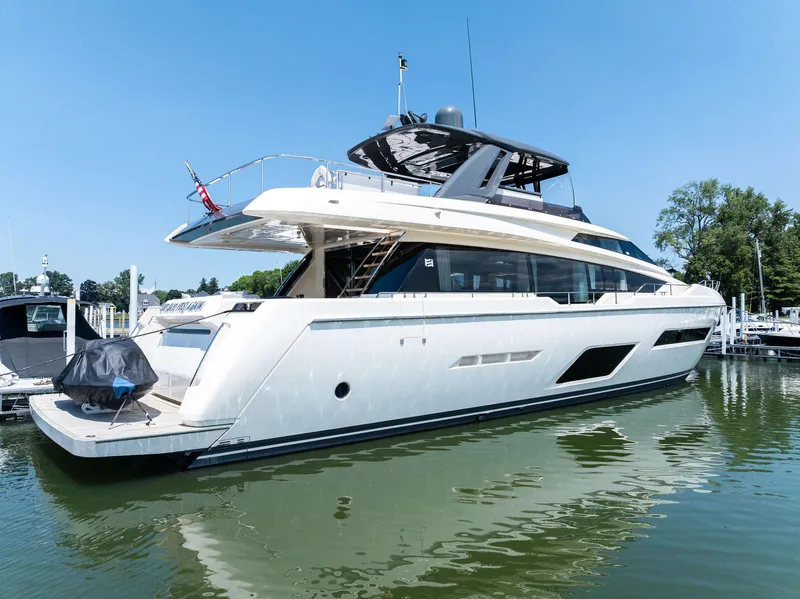 Slide: The Image of Luxury 2018 Ferretti Yachts 780 docked in a serene marina setting. - 2