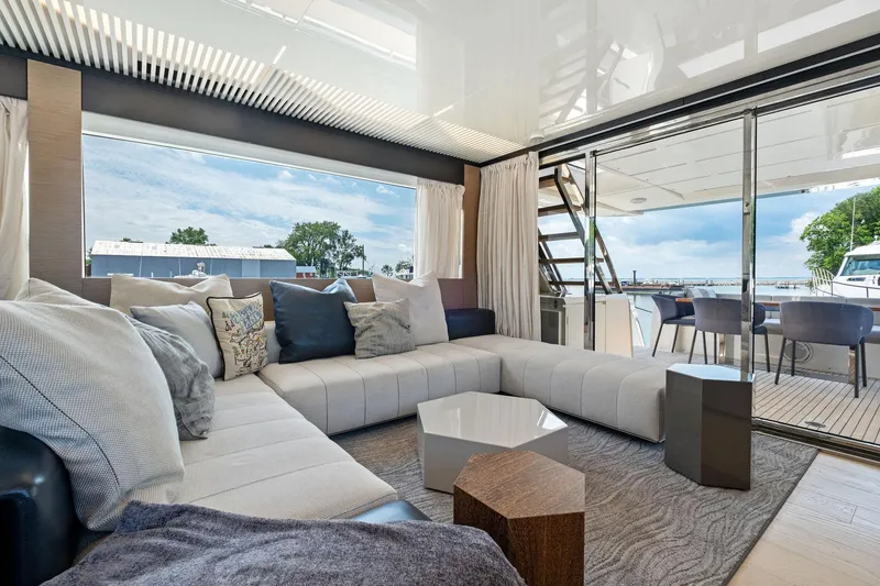 Slide: The Image of Luxurious interior of 2018 Ferretti Yachts 780 with modern seating and outdoor view. - 35