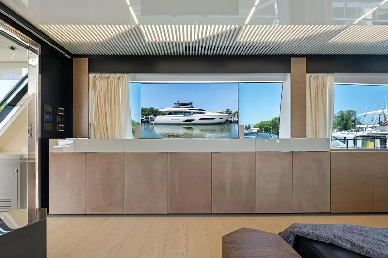 Slide: The Image of Luxurious interior of 2018 Ferretti Yachts 780 with large window view of yacht. - 36