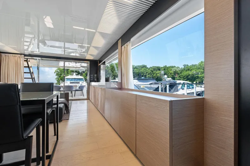 Slide: The Image of Luxurious interior of 2018 Ferretti Yachts 780 with modern design and marina view. - 39