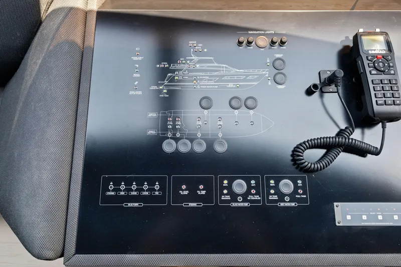 Slide: The Image of Control panel of a 2018 Ferretti Yachts 780 with navigation and communication equipment. - 44