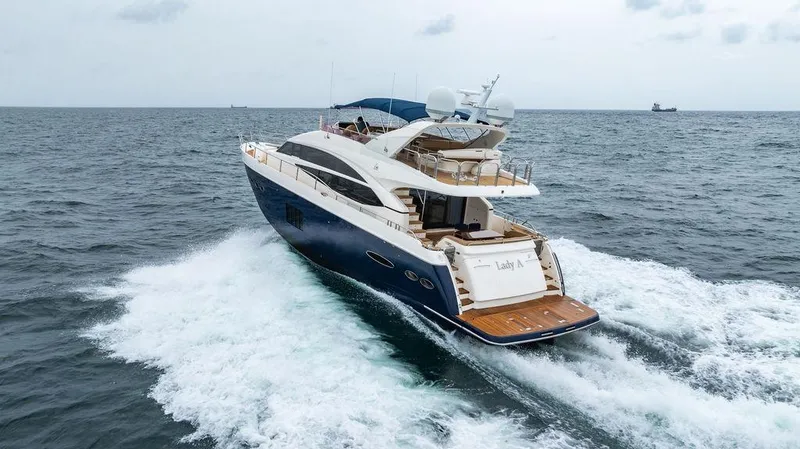 Slide: The Image of Luxury 2012 Princess 72 Motor Yacht cruising on open sea. - 13