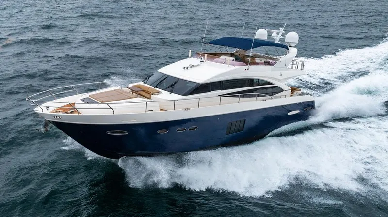 Slide: The Image of Luxurious 2012 Princess 72 Motor Yacht cruising on open sea. - 17