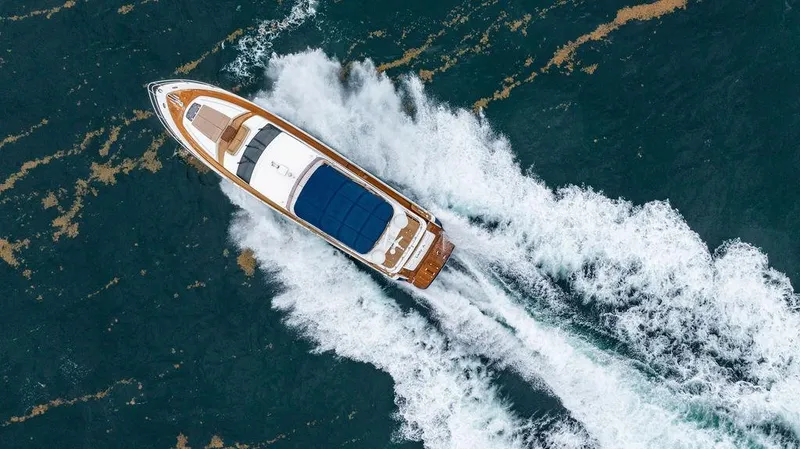 Slide: The Image of Aerial view of 2012 Princess 72 Motor Yacht cruising through ocean waves. - 19