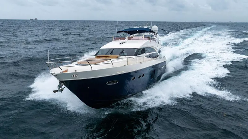 Slide: The Image of Luxury 2012 Princess 72 Motor Yacht cruising on open sea. - 23