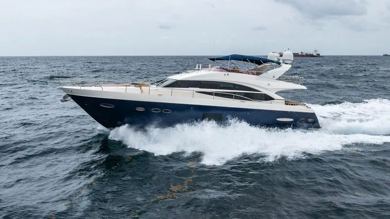 Slide: The Image of 2012 Princess 72 Motor Yacht cruising on open sea. - 24