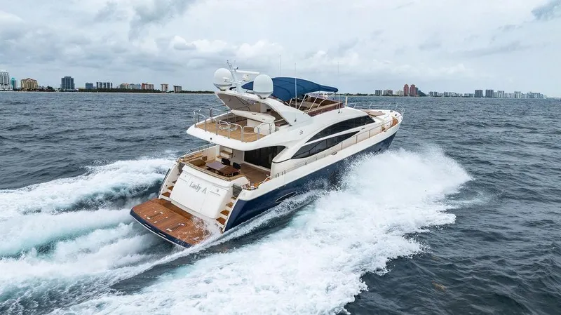 Slide: The Image of Luxurious 2012 Princess 72 Motor Yacht cruising on open water. - 25