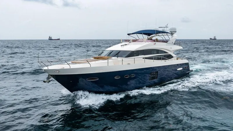 Slide: The Image of Luxurious 2012 Princess 72 Motor Yacht cruising on open sea. - 26