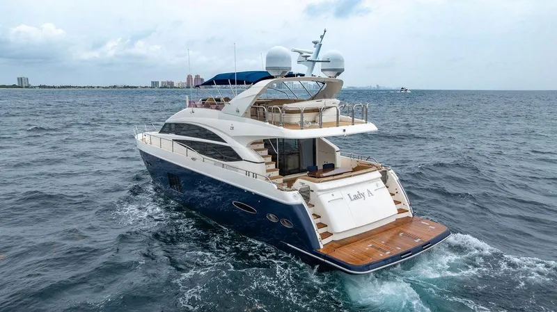 Slide: The Image of Luxurious 2012 Princess 72 Motor Yacht cruising on open water. - 27