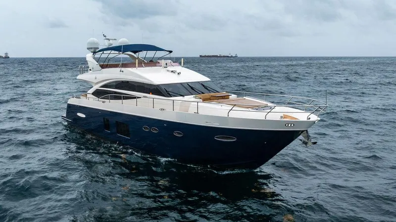 Slide: The Image of Luxury 2012 Princess 72 Motor Yacht cruising on open sea under cloudy skies. - 28