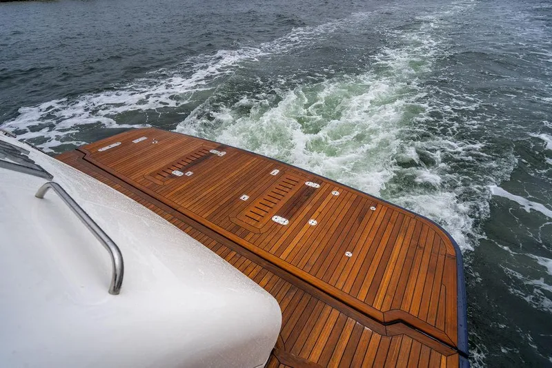 Slide: The Image of Teak deck of 2012 Princess 72 Motor Yacht cruising on open water. - 37