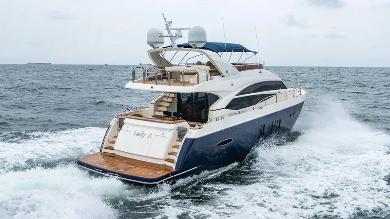 Slide: The Image of Luxurious 2012 Princess 72 Motor Yacht cruising on open sea. - 4