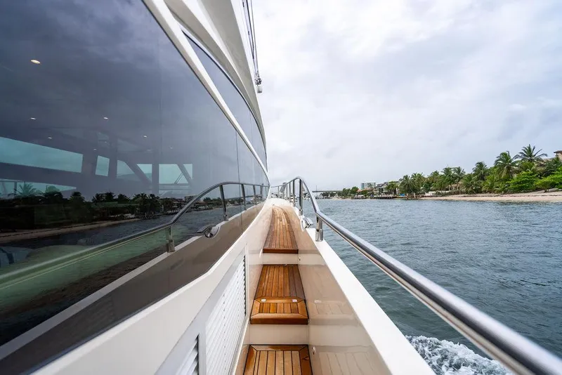 Slide: The Image of Side view of 2012 Princess 72 Motor Yacht cruising near a tropical shoreline. - 41