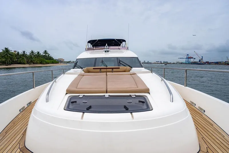 Slide: The Image of 2012 Princess 72 Motor Yacht on water, featuring spacious deck and luxurious seating. - 45