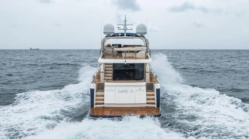 Slide: The Image of 2012 Princess 72 Motor Yacht cruising on open sea, rear view. - 5