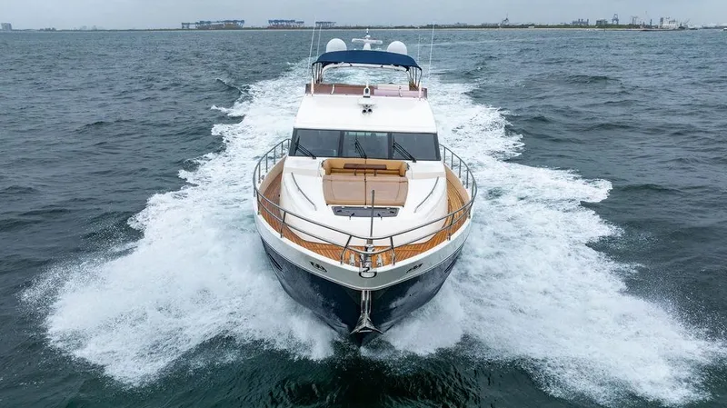 Slide: The Image of Princess 72 Motor Yacht 2012 cruising on open water, showcasing luxury and performance. - 8