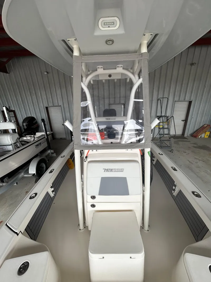 Slide: The Image of Garmin display on 2023 Pathfinder 2300 HPS boat dashboard, outdoor setting. - 8