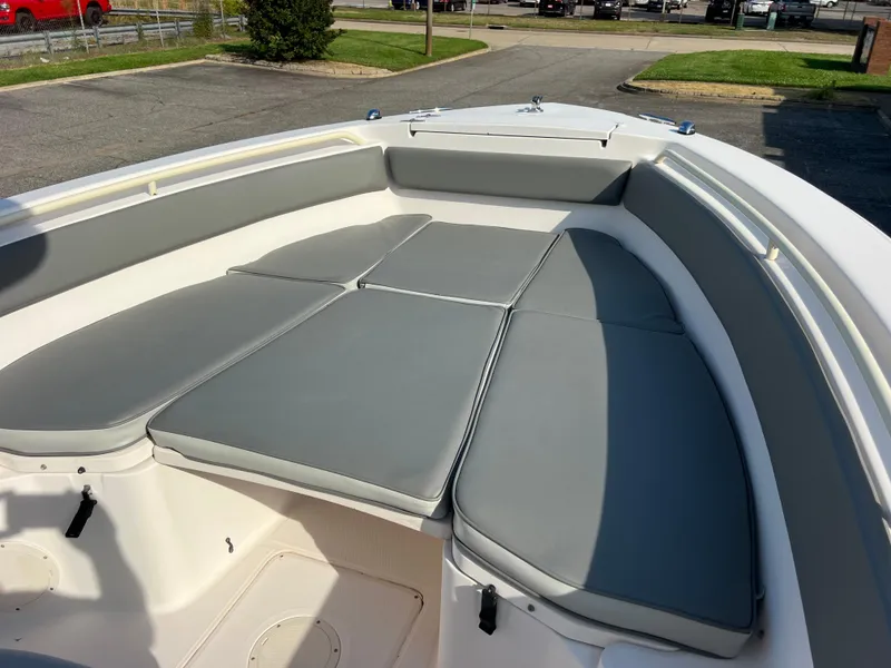 Slide: The Image of 2002 Grady-White Chase 273 boat, white exterior, docked at marina under clear blue sky. - 40