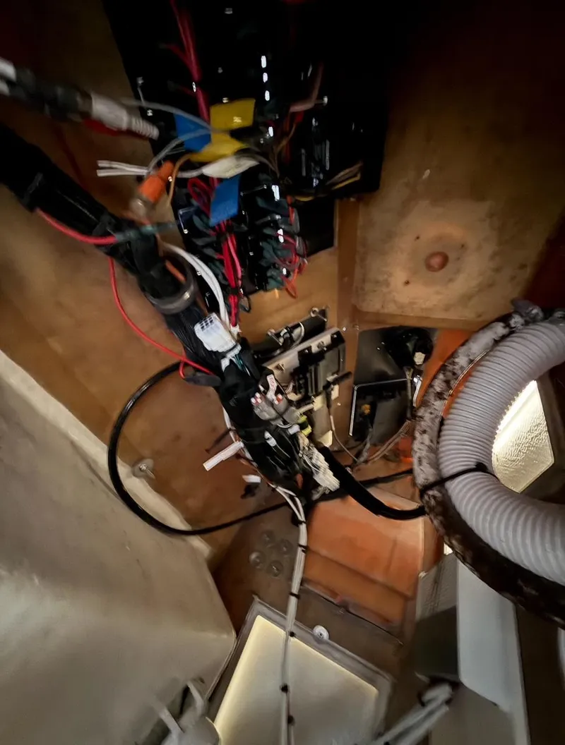 Slide: The Image of Electrical wiring and components inside a 2003 Storm Boats model 21. - 11