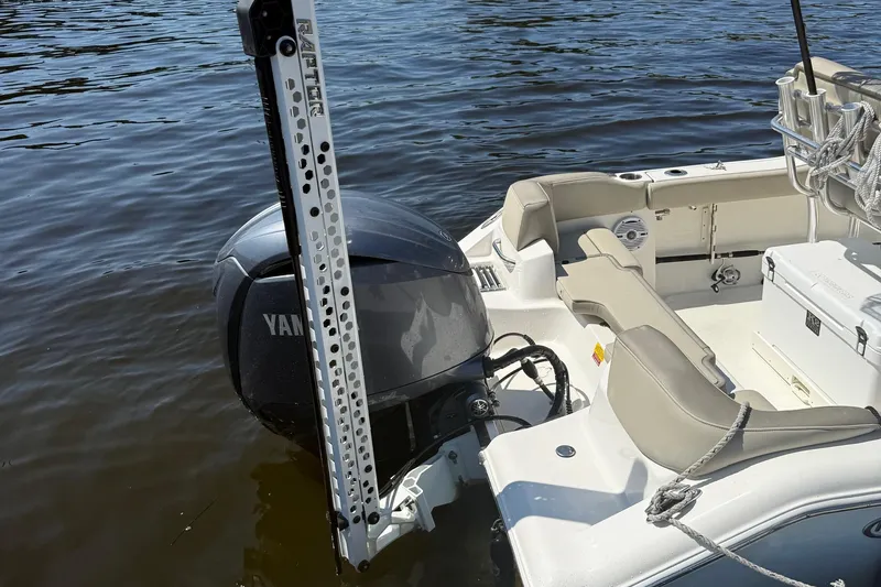 Slide: The Image of 2023 Key West 203 FS boat with Yamaha engine on calm water. - 26