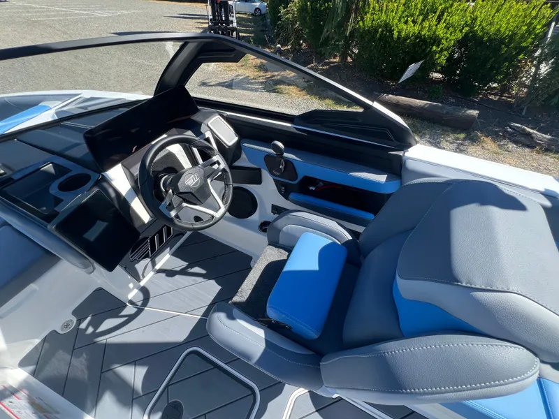 Slide: The Image of Interior of 2025 Malibu Wakesetter 23 LSV with modern helm. - 28