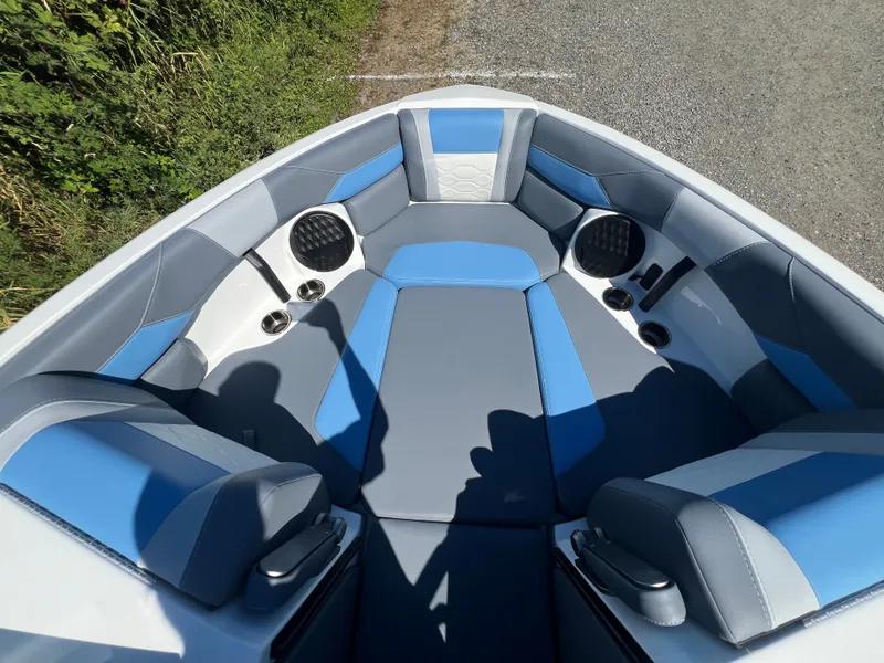 Slide: The Image of Interior of 2025 Malibu Wakesetter 23 LSV with blue and gray seating. - 30