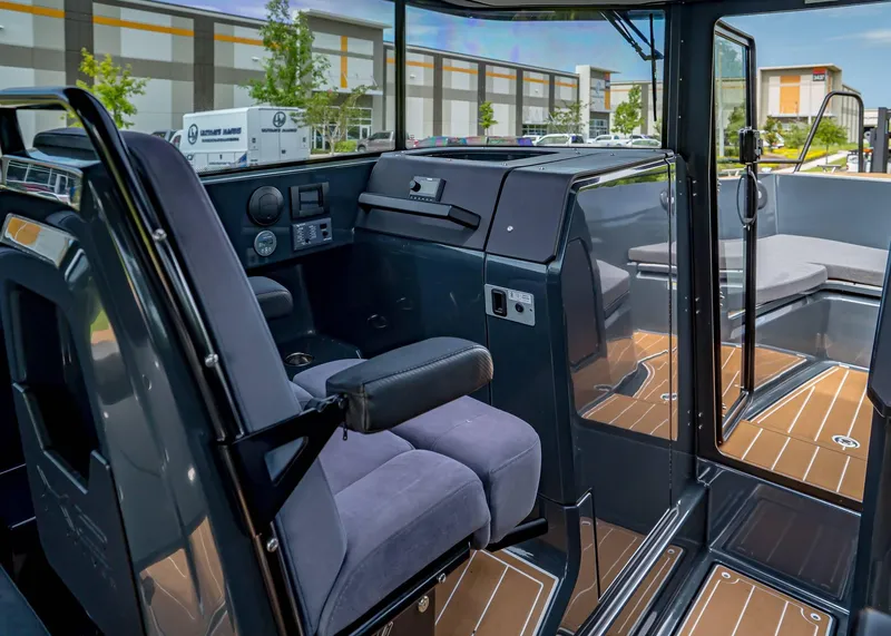 Slide: The Image of 2023 XO Boats EXPLR 9 interior with modern seating and sleek design. - 14